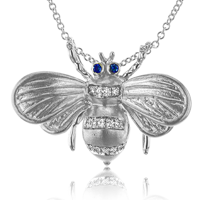1/100 CTW Diamond Pendant in 14K Gold And 18K Gold